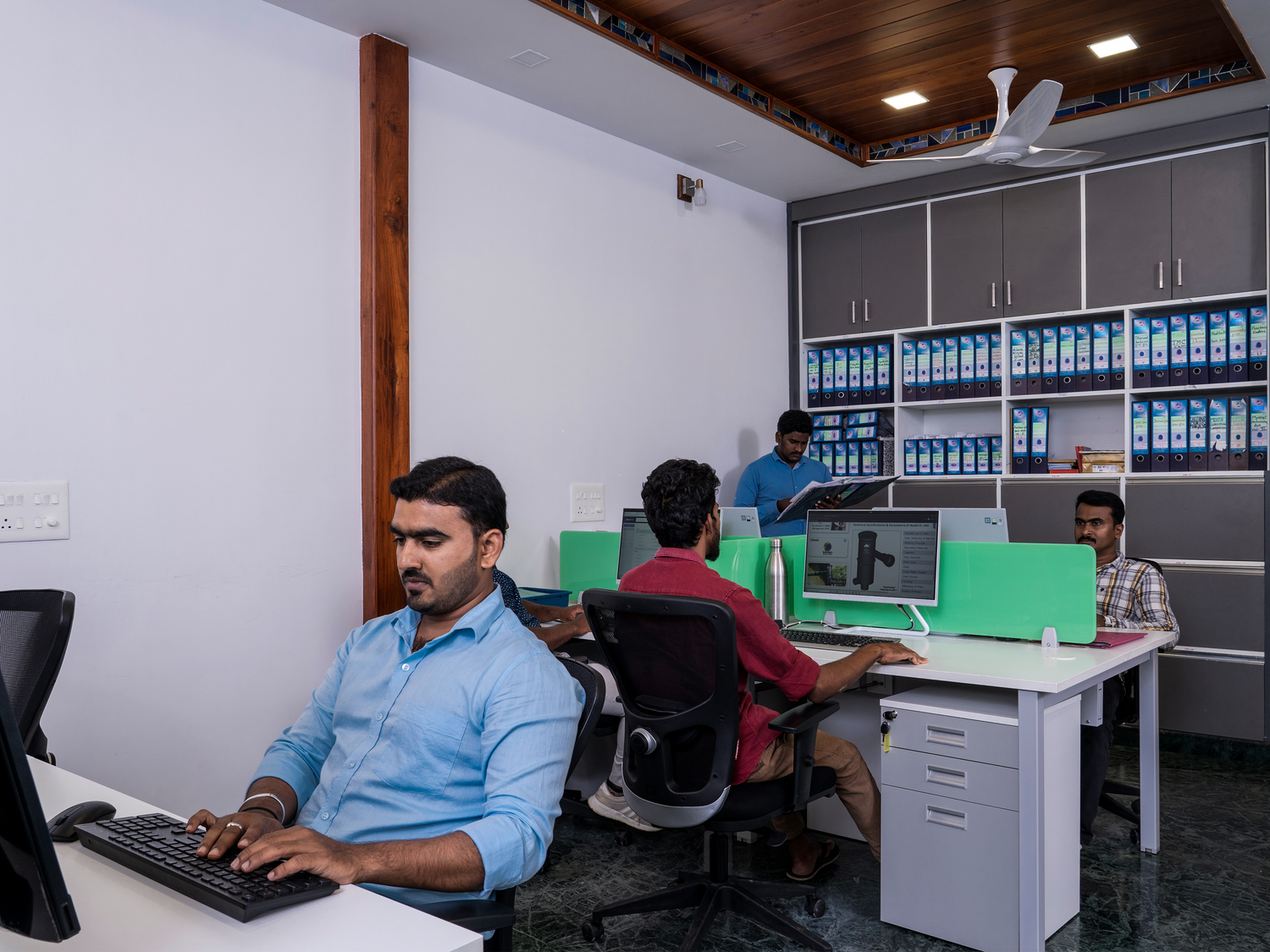 Team Members Working on Water Harvesting System with Rainy Filters in the Department